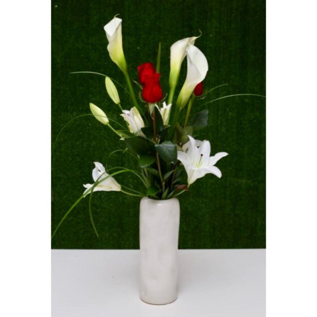 Elegant Floral Wonder in a Ceramic Vase - Shalimar Flower Shop